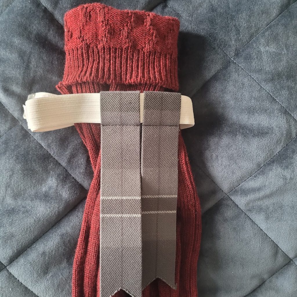 Klassisk kilt hose i ull – traditionell strumpa buren till kilt